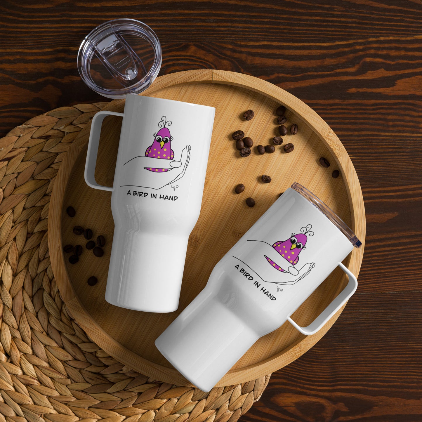 A Bird in Hand Travel mug with a handle from The Quirky Birds Collection