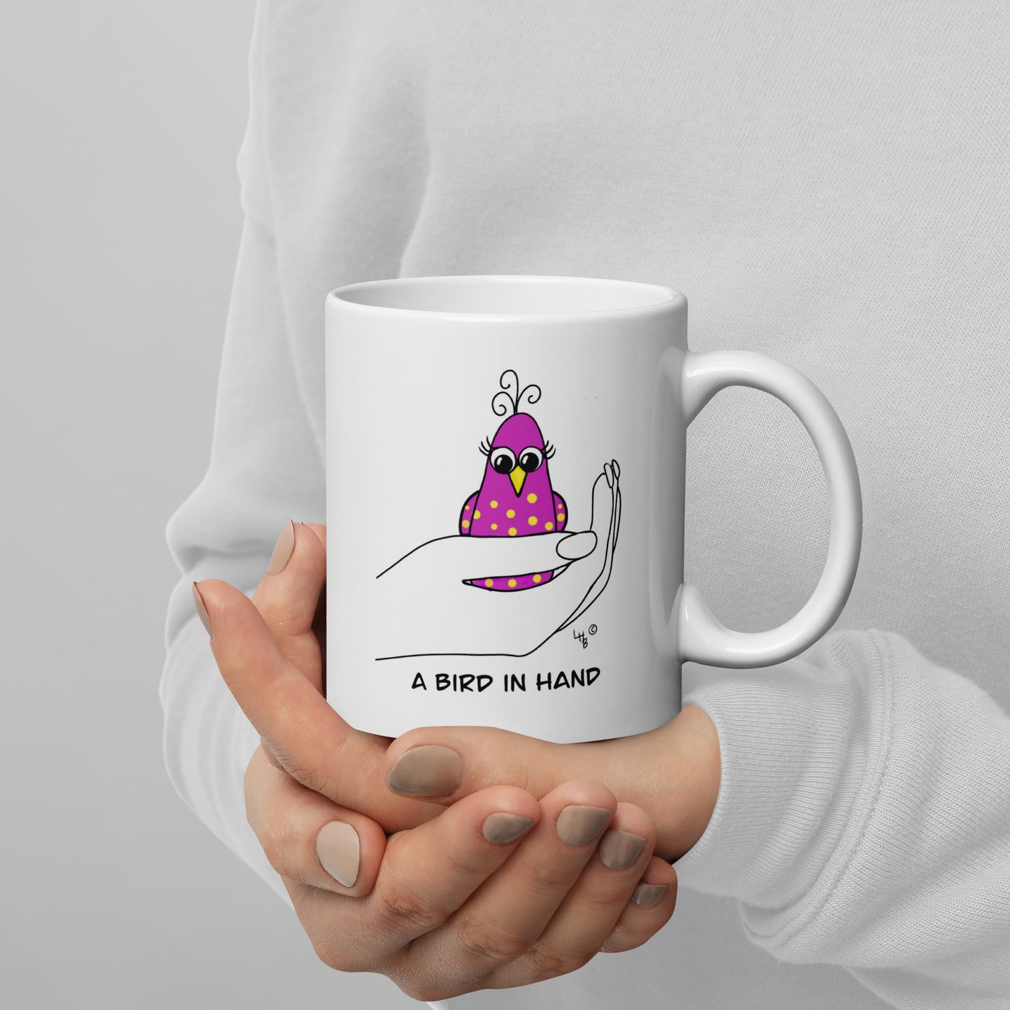 A Bird in Hand White glossy mug from The Quirky Birds Collection