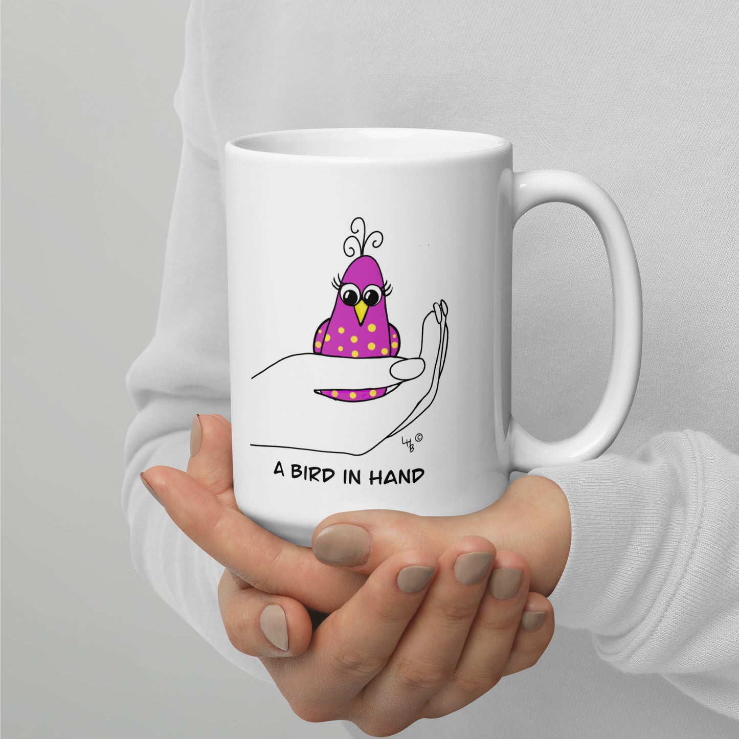 A Bird in Hand White glossy mug from The Quirky Birds Collection