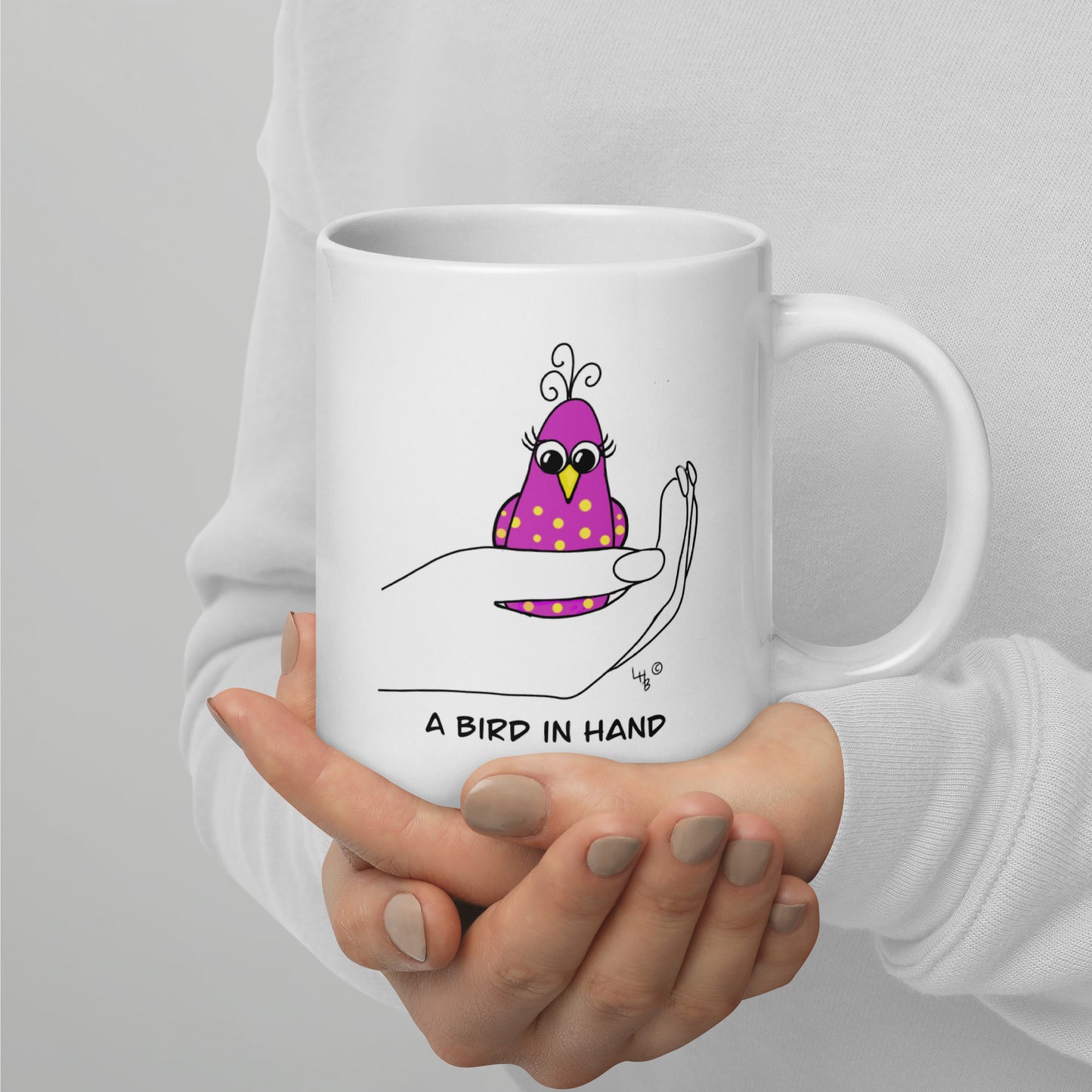 A Bird in Hand White glossy mug from The Quirky Birds Collection